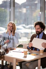 Business professionals working in office during meeting
