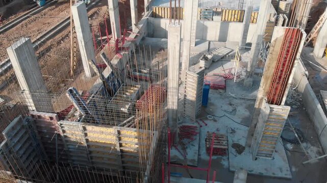 Construction site. A span over a building under construction. aerial view.