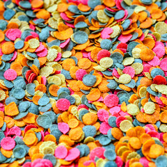 Aquarium fish fodder closeup.Food for aquarium fish in the form of colorful flakes.Top view