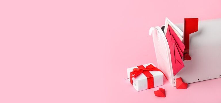 Mailbox with letters, hearts and gift on pink background with space for text. Valentine's Day celebration - Powered by Adobe