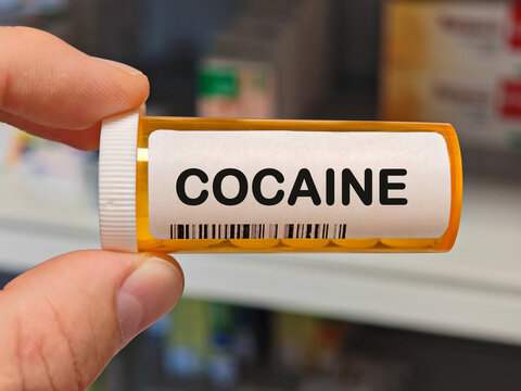Box of COCAINE tablets on a hospital pharmacy table used as a local anesthetic and vasoconstrictor a stimulant alkaloid.