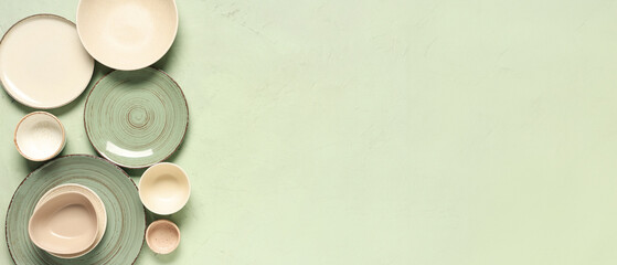 Different clean plates on green background