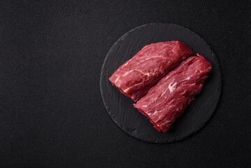 Naklejka premium Raw meat, fresh beef tenderloin or filet mignon for grilling. Raw beef tenderloin