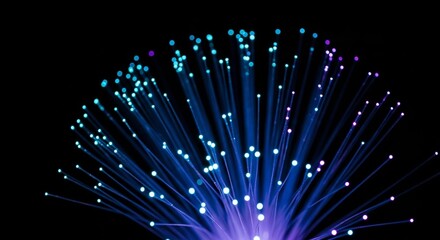 Blue light emits from the thin glass filaments, suggesting futuristic technology and advanced network connectivity.