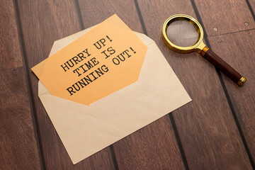 Time is running, text on notepad with clock on white background