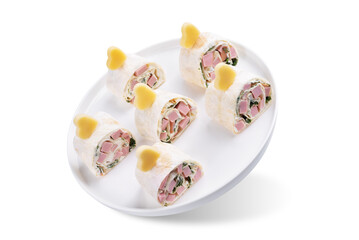 Cream cheese dill ham pinwheel on a plate for Valentine's day holidays on a white isolated background