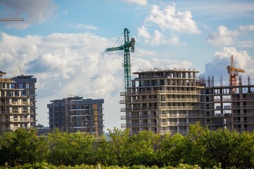 Buildings construction and crane. Residential Buildings