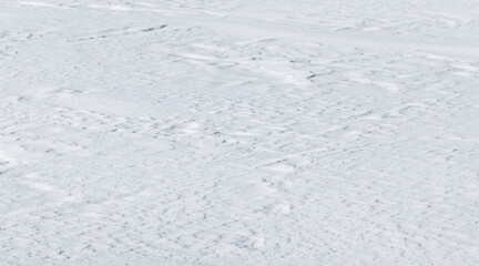 White snowdrift is under bright sunlight on a winter day, natural background photo