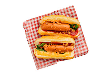 Hotdog fried onions, sausage, bun, sauce fast food tasty snack fresh delicious gourmet food background on the table rustic top view copy space