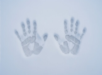 handprints in snow. Handprints imprinted in fresh snow on a winter morning  