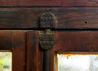 Vintage Metal Hinge on Wooden Door