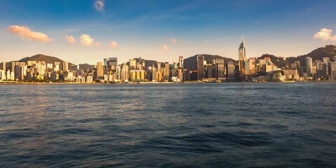 Scenic view of the Hong Kong Convention and Exhibition Centre and the Central Plaza skyscraper, nestled among other skyscrapers in Hong Kong, China