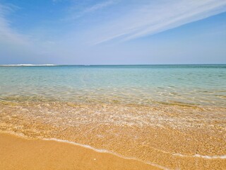 clear water, beach and blue sky