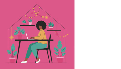 Black woman works remotely from a colorful cozy home office surrounded by indoor plants