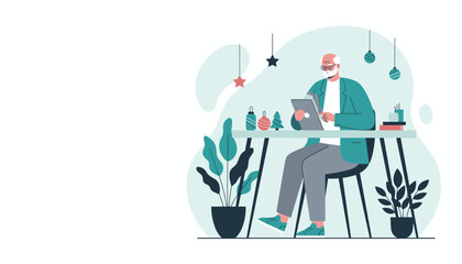 Senior man working remotely on a tablet in a festive modern office with Christmas decorations