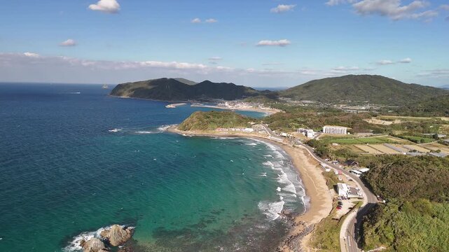 Coastal Road and Town in Sakurai, Itoshima and Nishinoura, Nishi Ward, Fukuoka, Japan &ndash; 4K Aerial Drone Footage of Futamigaura Couple Stones, Torii Gate, Rocky Coastline, Blue Ocean, Mountain Forests