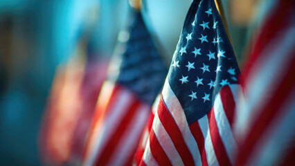 A close-up view of a vibrant American flag, with its stars and stripes prominently displayed, in a row of blurred flags, embodying patriotism.