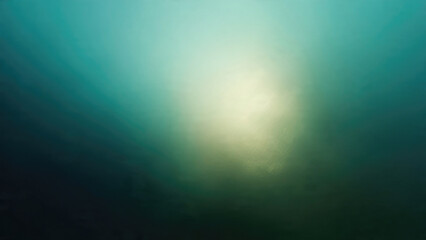 Obraz premium Abstract background with a radiant yellowish-green glow over deep teal and aqua gradients, creating a serene, atmospheric feel.