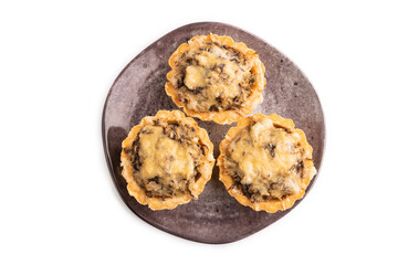 Tartlets with meat and cheese isolated on white. top view, flat lay, copy space