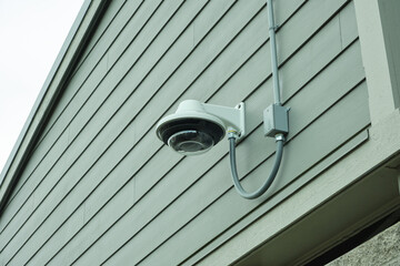 CCTV camera installed on the wall of a building.