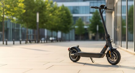 Modern electric scooter parked on a city sidewalk for sustainable urban mobility concept and eco-friendly commuting solution