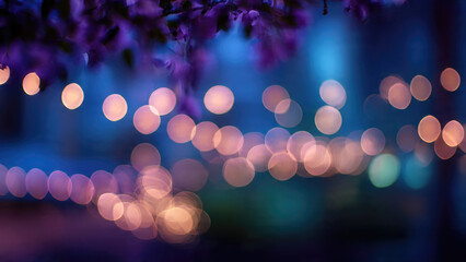 Warm, glowing bokeh lights against a deep blue and purple background, creating a dreamy, abstract, and magical night atmosphere.
