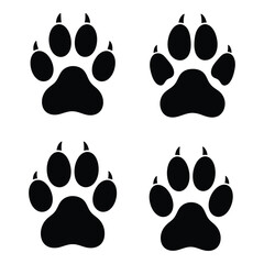 Fototapeta premium Four black dog paw prints on a white background