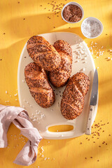 Healthy and hot flax seed buns baked in a bakehouse.