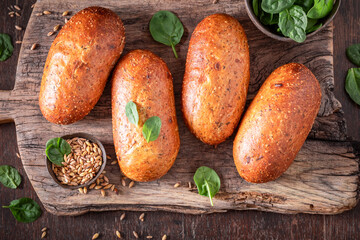 Tasty and fresh spinach buns baked in a home oven.
