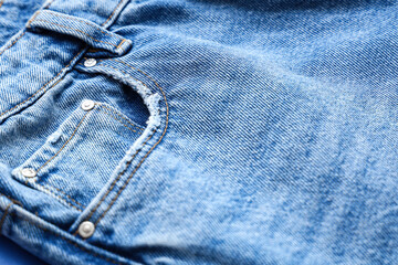 Naklejka premium Stylish jeans as background, closeup