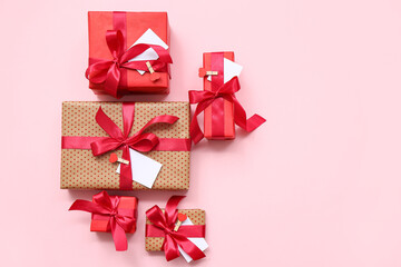 Composition with beautiful gift boxes for Valentine's Day celebration on pink background