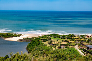 Forest view with lake and ocean in background