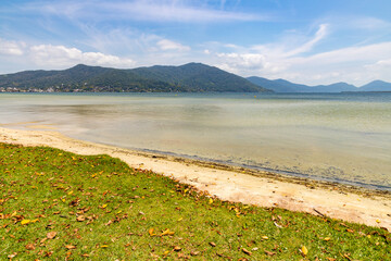 Conceicao lake with grass and mountains in background