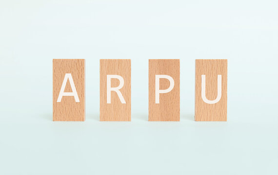 There is wood block with the word ARPU. It is an abbreviation for Average Revenue Per User as eye-catching image.