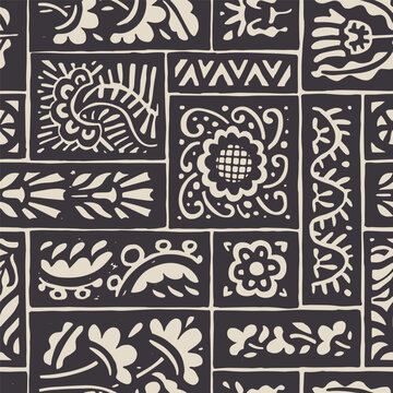 Seamless ornamental block pattern. Hand-drawn floral and geometric elements in bold contrast. Vintage craft-inspired layout for decor. Vector illustration.