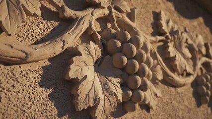 Ornate floral vine and grape cluster architectural detail texture close up - Powered by Adobe