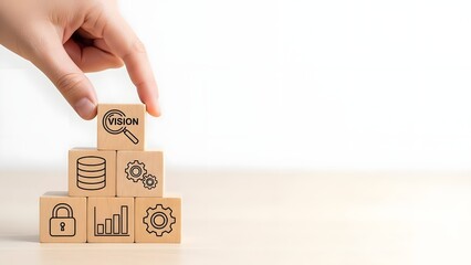 Hand placing wooden block with key icon on tower of security symbols
