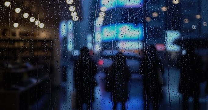 Silhouettes of people queuing outside shop at night with neon reflections. Urban concept.