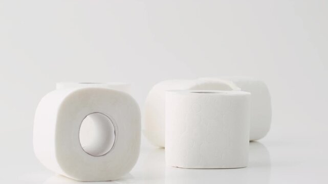 dropping toilet paper on floor