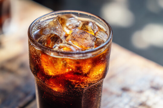 close-up of refreshing cold brew coffee with ice cubes in glass - Powered by Adobe