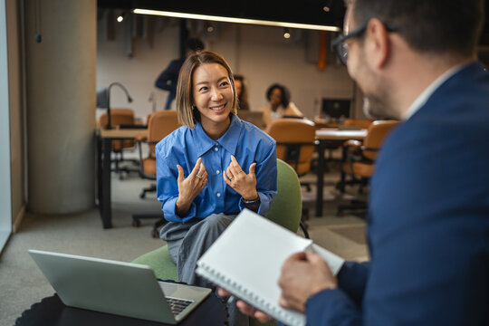 Smiling businesswoman having a job interview in modern office