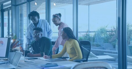 Collaborating team in smart-casual attire studying laptop and chart at glass office with tripod