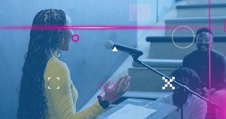 Speaking speaker yellow top smartwatch addressing on steps at hall, podium or mic or notes, copy spa