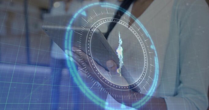 Holding tablet office worker in light jacket and lanyard interacting with holographic HUD at office