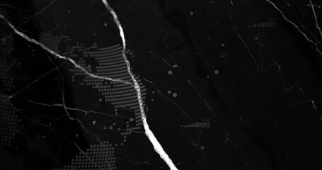 Showing bright diagonal vein crossing black marble slab with halftone map left and speckles