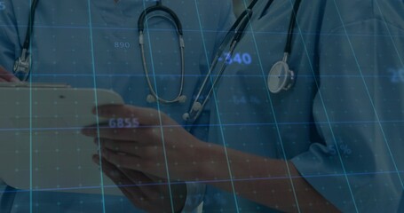 Tapping tablet, clinician in light blue scrubs at clinic, two stethoscopes and digital grid overlay
