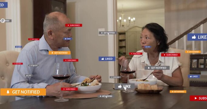 Man cutting food woman eating at table starting chat liked badges rising around for marketing