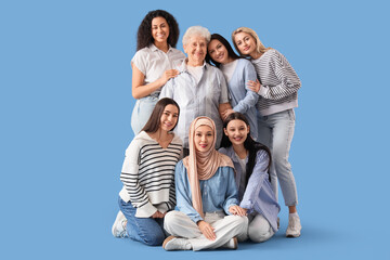 Group of beautiful women on blue background. Women's History Month