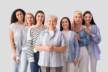 Obraz premium Group of beautiful women on light background. Women's History Month