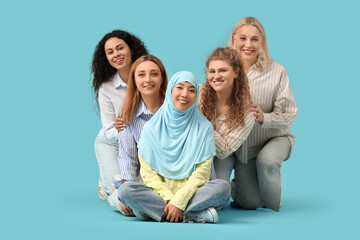 Obraz premium Group of beautiful women on blue background. Women's History Month